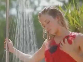 Pretty Madonna loves wetting herself with a shower